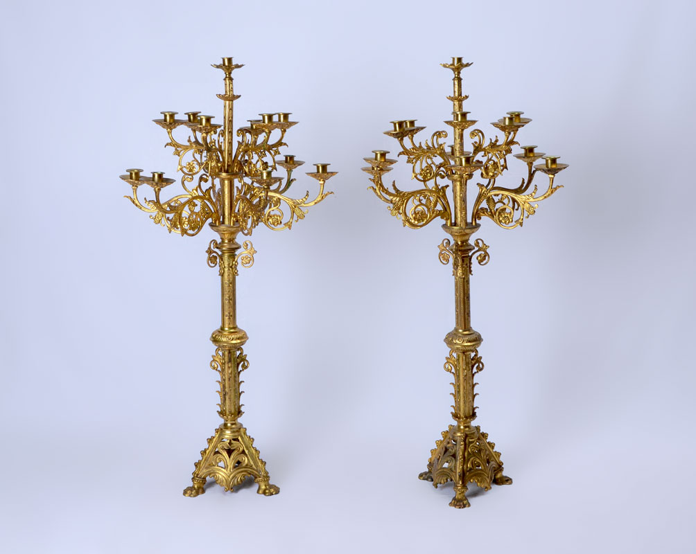 Appraisal: PAIR ROCOCO STYLE TALL BRASS LIGHT CANDELABRA Center top light