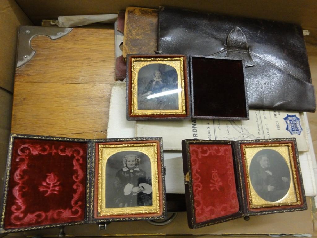 Appraisal: A small collection of Victorian daguerretype photographs in folding cases