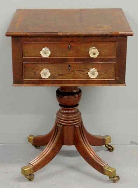 Appraisal: Classical inlaid mahogany two-drawer work table c with reeded down-swept