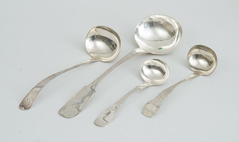 Appraisal: TWO AMERICAN SILVER PUNCH LADLES AND TWO GRAVY LADLES The