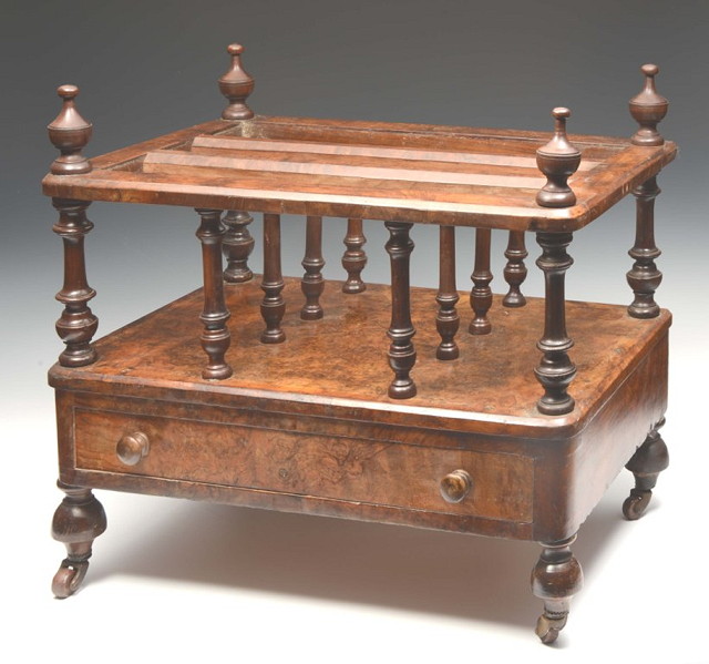 Appraisal: A VICTORIAN BURR WALNUT THREE DIVISIONAL CANTERBURY with turned supports