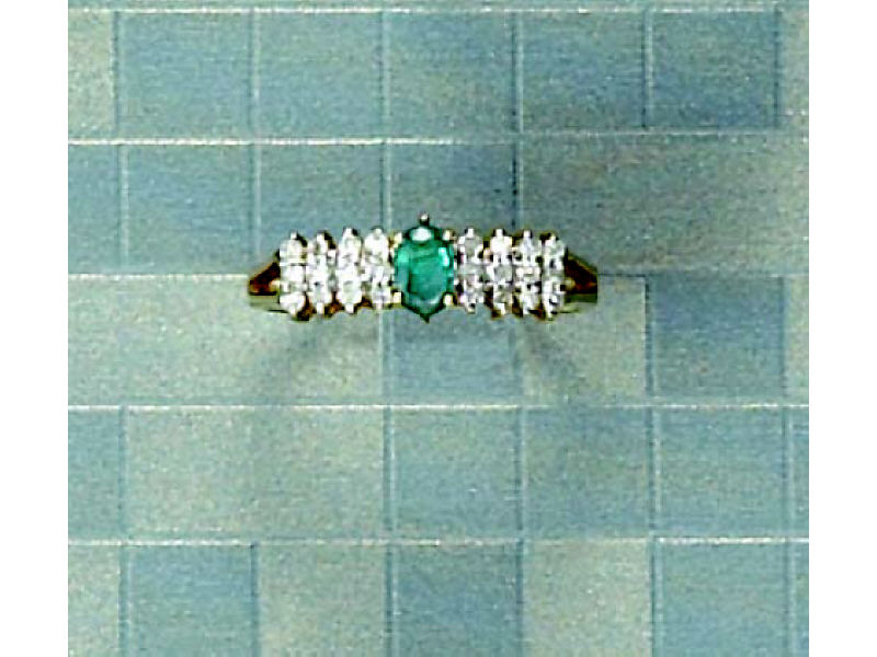 Appraisal: EMERALD AND DIAMOND RING k yellow gold lady's ring set