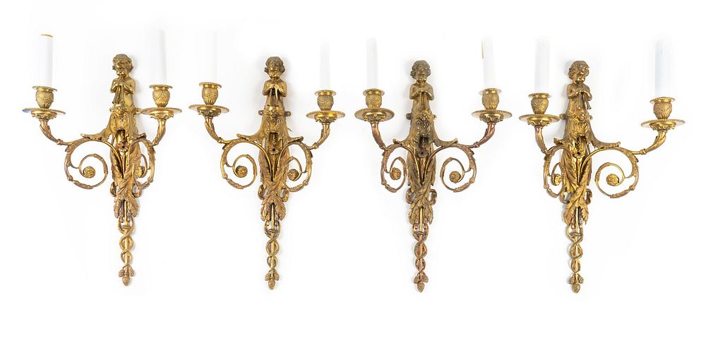 Appraisal: A Set of Four Louis XVI Style Gilt-Bronze Sconces Height