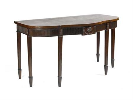 Appraisal: A mahogany serpentine serving table circa In the neo-classical manner