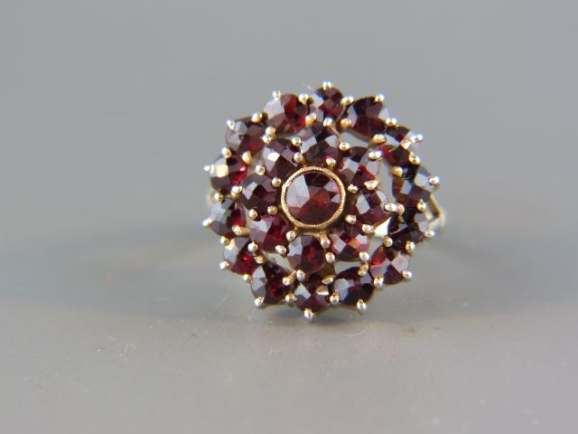 Appraisal: Garnet Ring vivid red gems in sterling silver currently size