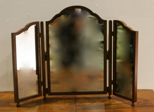 Appraisal: A three panel mahogany framed free standing mirror cm high