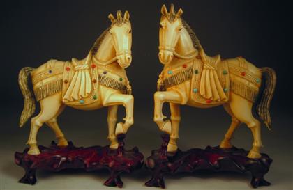 Appraisal: Pair of Chinese elephant ivory and stone applied carved horsesThe