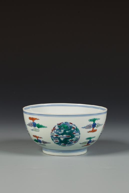 Appraisal: A CHINESE DOUCAI BOWL decorated with circular panels of scaly