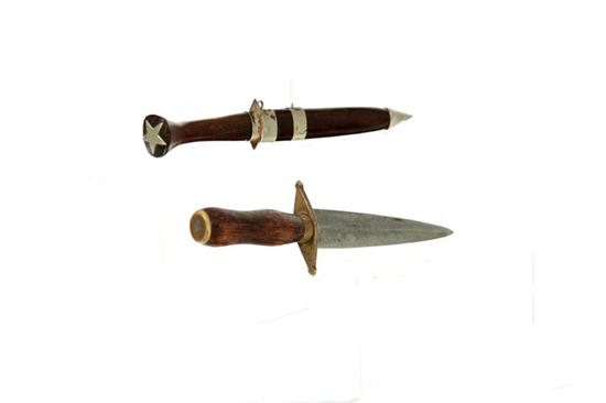 Appraisal: TWO DAGGERS American or European th century Earlier one has