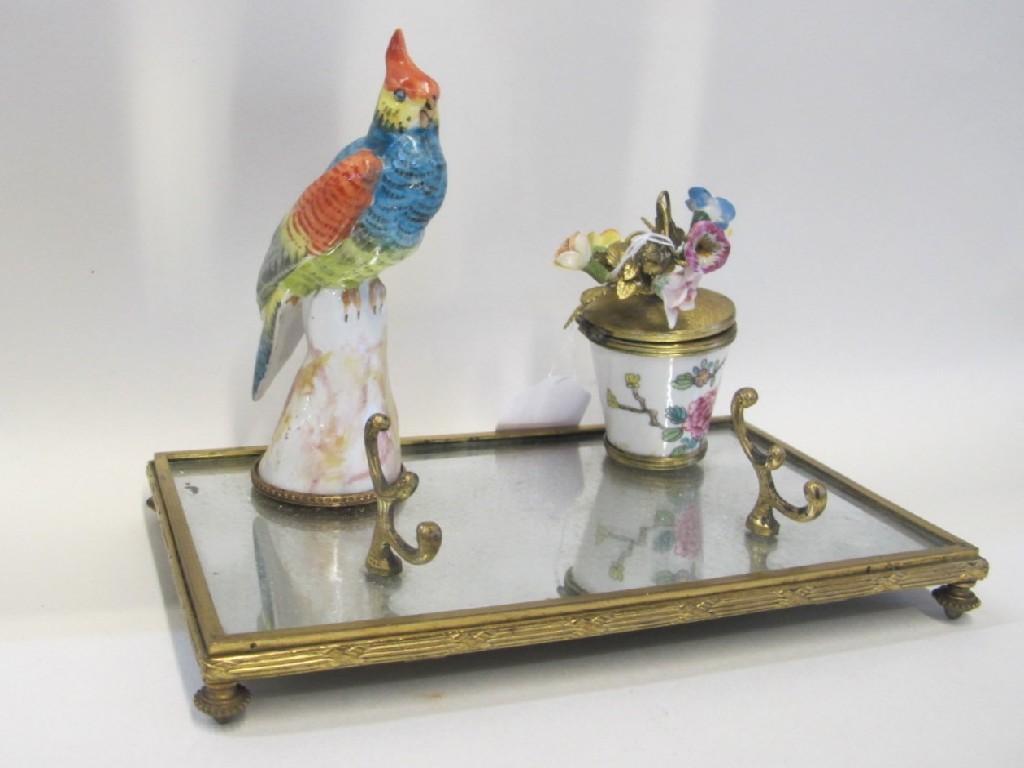 Appraisal: Mirrored glass deskstand with porcelain inkwell and bird decoration together