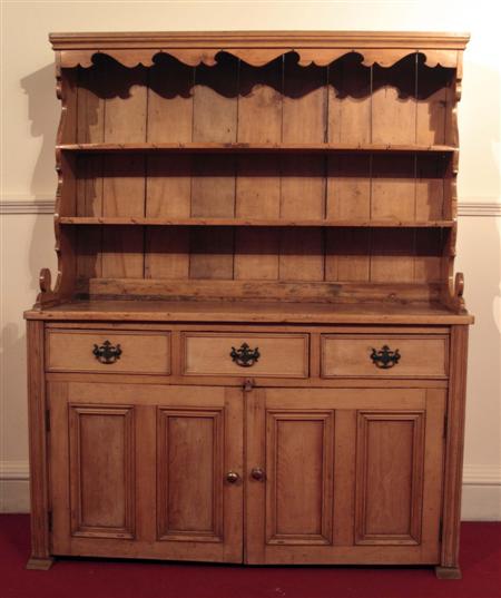 Appraisal: A Victorian pine dresser the superstructure with moulded cornice above