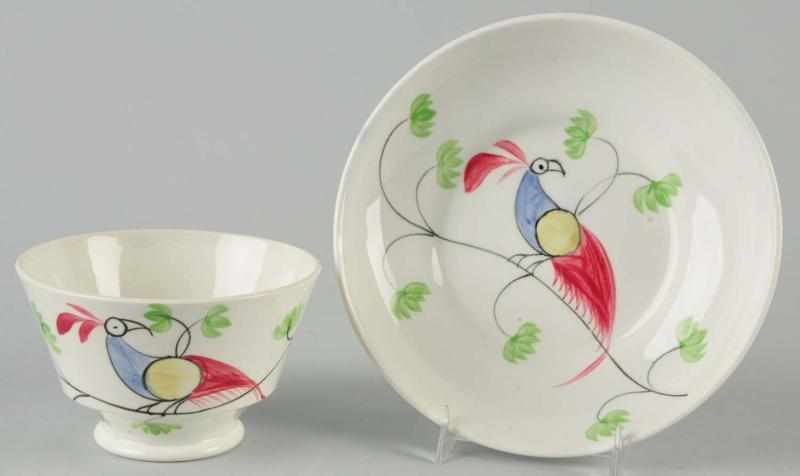 Appraisal: Leeds Cup Saucer Description Matching set Blue yellow red and