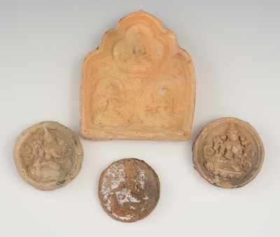 Appraisal: A Group of Terracotta Buddhist Amulets Including a molded terracotta