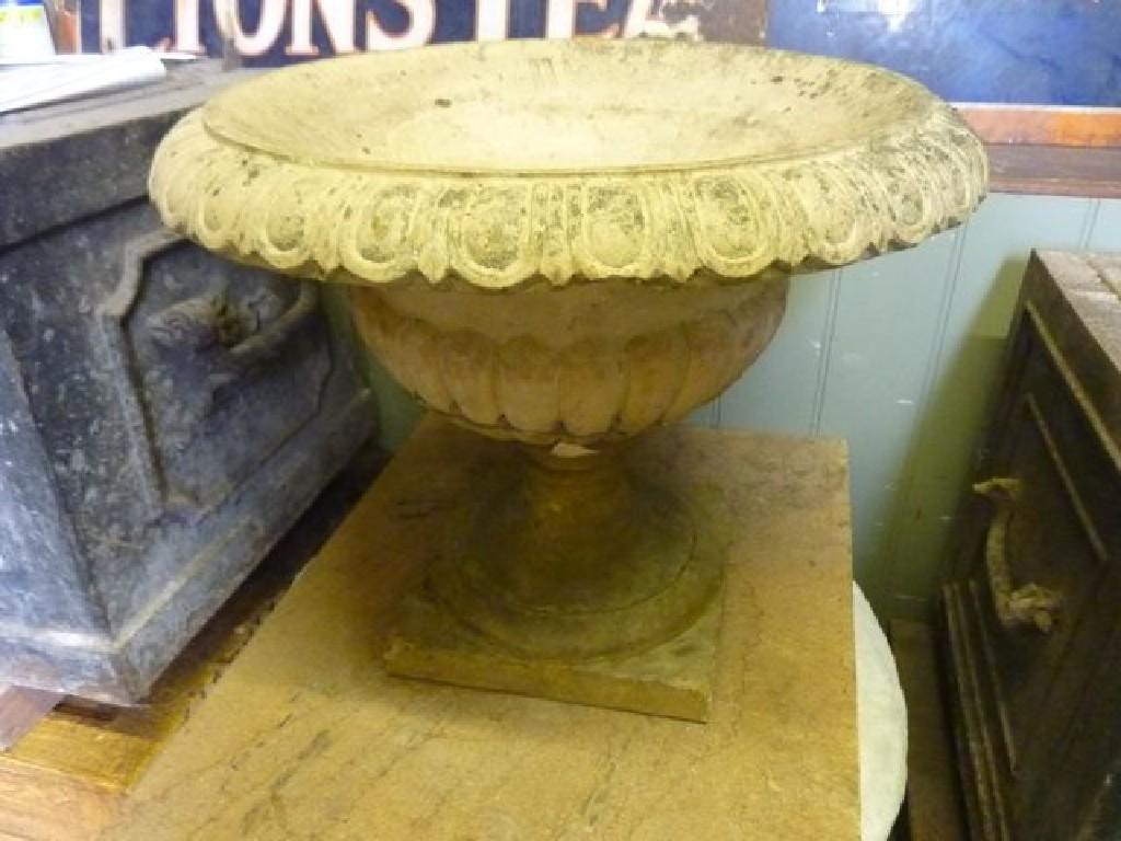 Appraisal: A th century buff coloured terracotta garden urn the circular