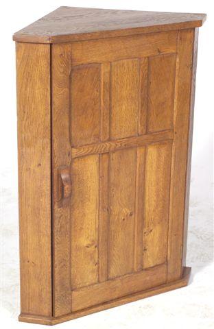 Appraisal: YORKSHIRE OAK HANGING CORNER CUPBOARD MID- th CENTURY with a