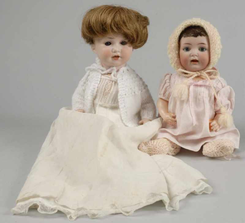 Appraisal: Lot of Cute German Bisque Character Baby Dolls Description Bisque