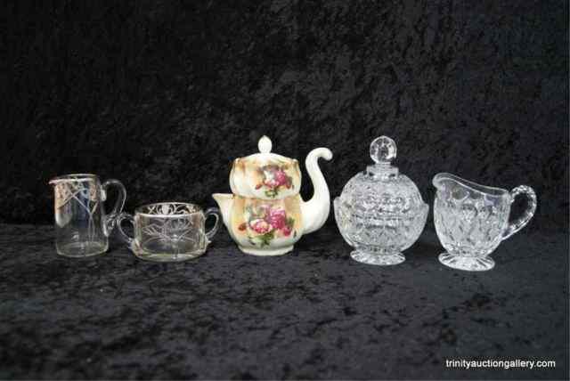 Appraisal: Elegant Cream Sugar Sets Crystal PorcelainFrom the estate is a