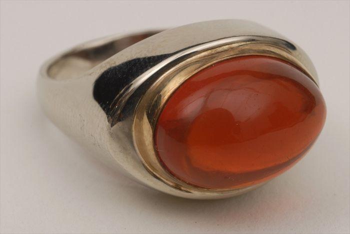 Appraisal: RING SET WITH CABOCHON STONE Size Provenance Property from the