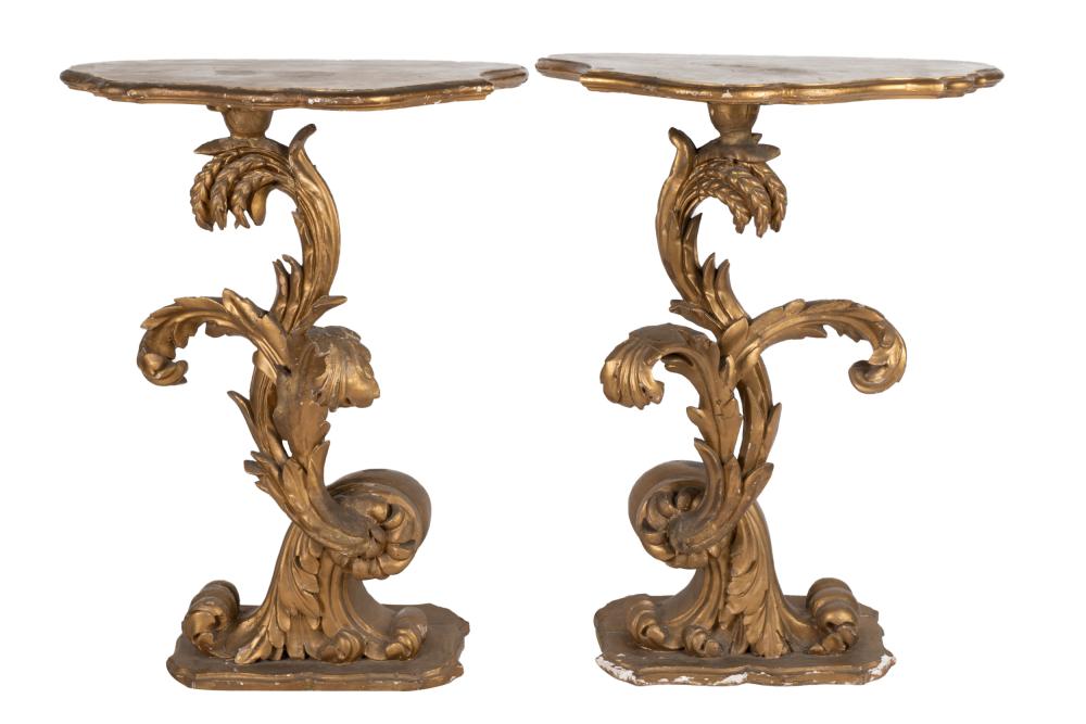 Appraisal: PAIR OF ROCOCO STYLE GILTWOOD STANDSeach with asymmetrical serpentine top