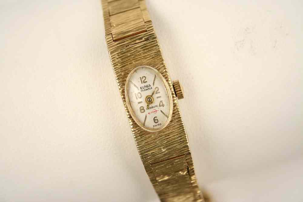 Appraisal: LADY'S WRISTWATCH - K yellow gold textured case with K