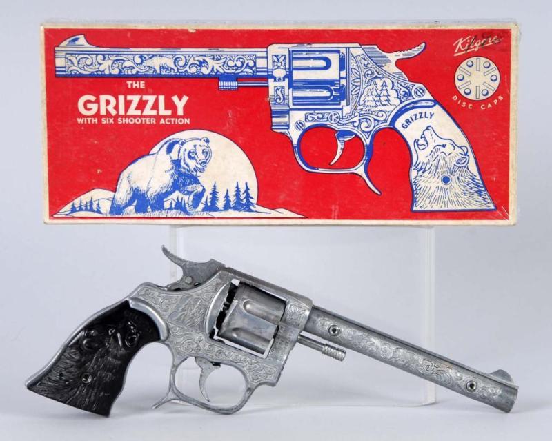 Appraisal: The Grizzly Cap Gun Description Darkened finish Includes box Condition