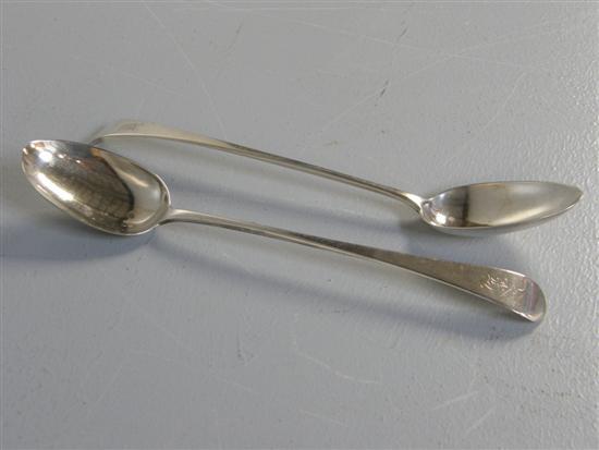 Appraisal: Pair of George III silver gravy spoons London oz long