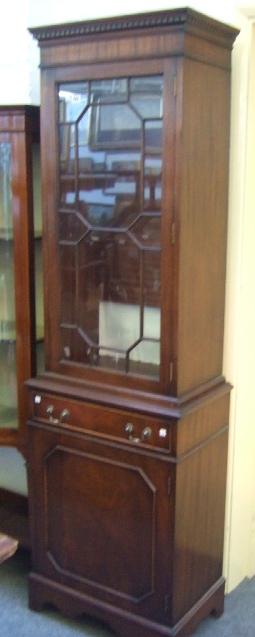 Appraisal: A George III style display cabinet the astragal glazed door