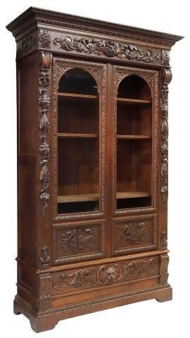 Appraisal: French carved oak bookcase late th c egg-and-dart molded cornice