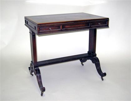 Appraisal: Figured mahogany side tableThe rectangular top with cross band on