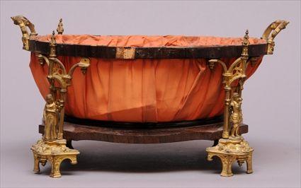 Appraisal: GOTHIC REVIVAL GILT-METAL ROSEWOOD AND SILK CENTERPIECE BASKET The pleated