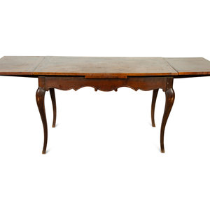 Appraisal: A French Walnut Draw-Leaf Dining Table Early th Century Height