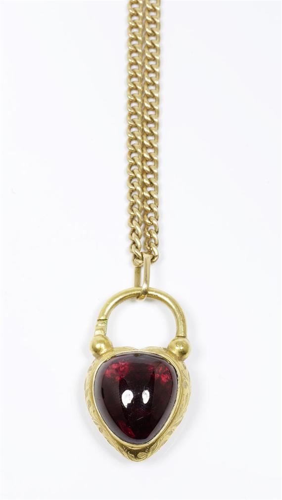 Appraisal: GOLD AND GARNET PENDANT ca with chain Yellow gold Fancy