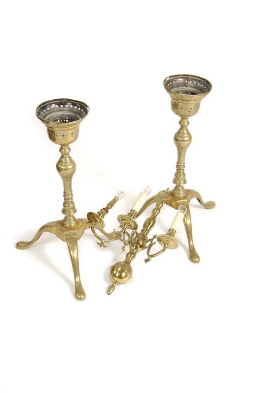 Appraisal: A pair of th century Dutch brass tripod kettle stands