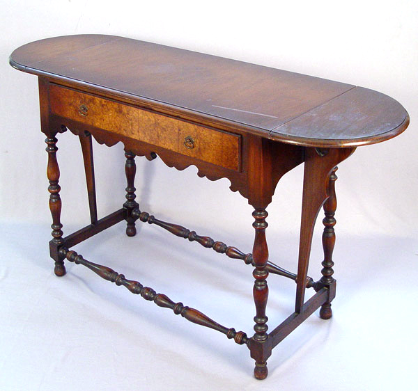 Appraisal: LENOX SHOPS WILLIAM AND MARY STYLE HALL TABLE Burled walnut