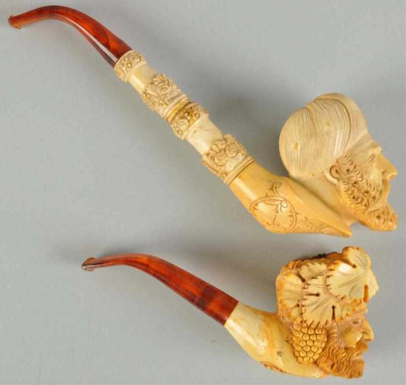 Appraisal: Lot of Meerschaum Pipes Description Includes two Arabian heads carved