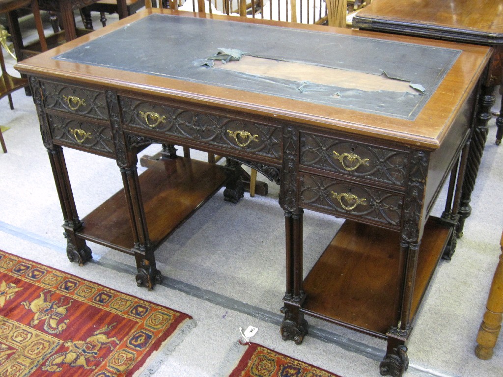 Appraisal: Victorian mahogany desk with leather insert top above an arrangement