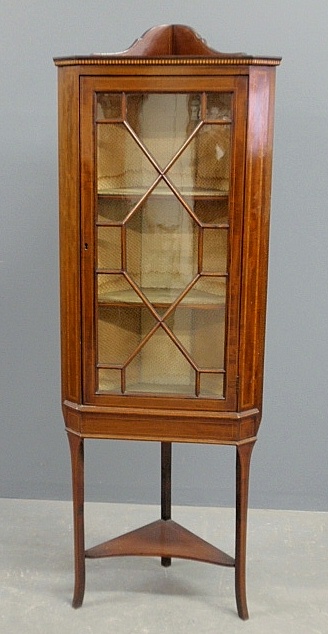 Appraisal: - Georgian style inlaid mahogany standing corner cabinet with mullioned