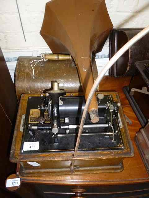 Appraisal: AN EDISON OAK CASED PHONOGRAPH MODEL 'C' complete with associated