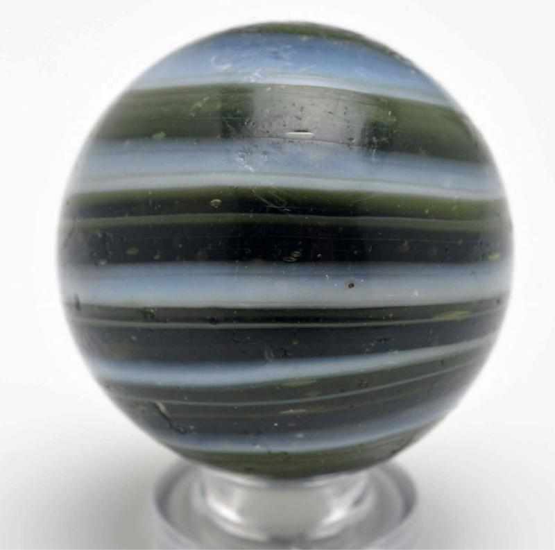 Appraisal: Navarre Single Pontil Horizontal Swirl Marble Description Dark green base