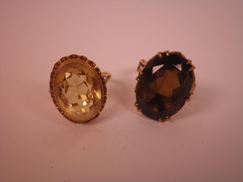 Appraisal: Two citrine and gold dress rings