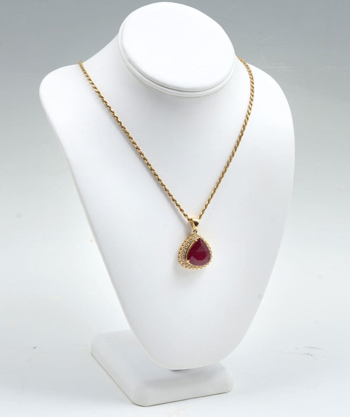 Appraisal: K RUBY DIAMOND PENDANT ON CHAIN This statement piece features