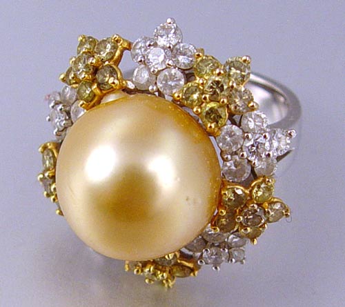 Appraisal: SOUTH SEA GOLDEN PEARL AND FANCY COLORED DIAMOND RING k