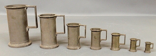 Appraisal: - Set of seven French pewter measures tallest h smallest