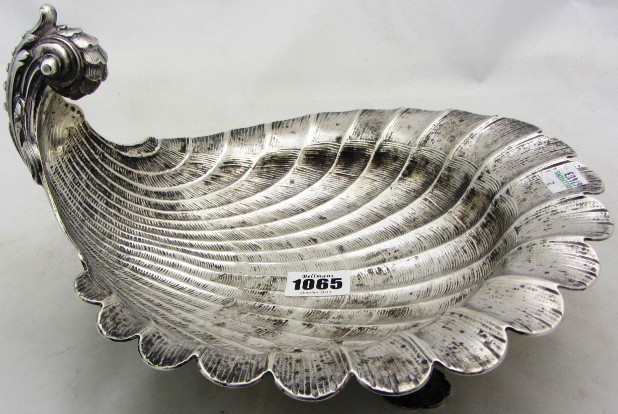 Appraisal: A German biscuit dish of scallop shell form with a