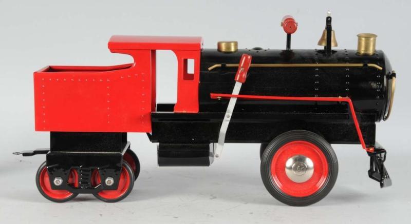 Appraisal: Pressed Steel Keystone Sit 'N Ride Train Set Description Includes