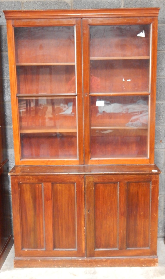 Appraisal: A principally late thC mahogany bookcase the moulded cornice raised