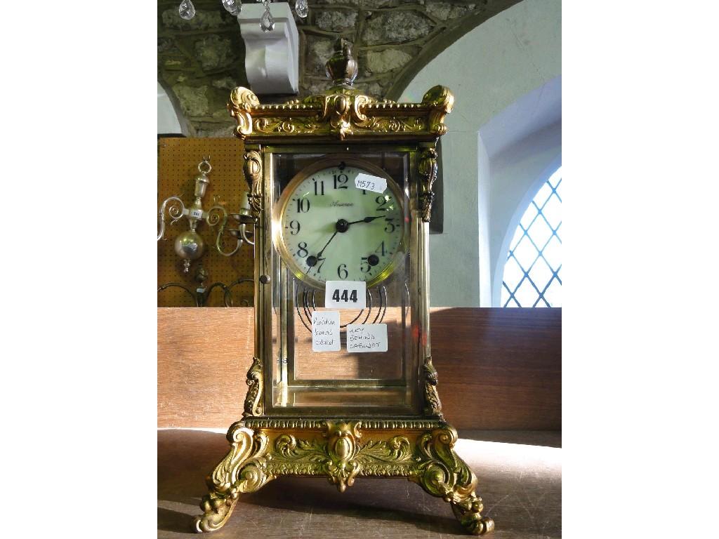 Appraisal: An Ansonia four pane mantle clock with gilded framework and