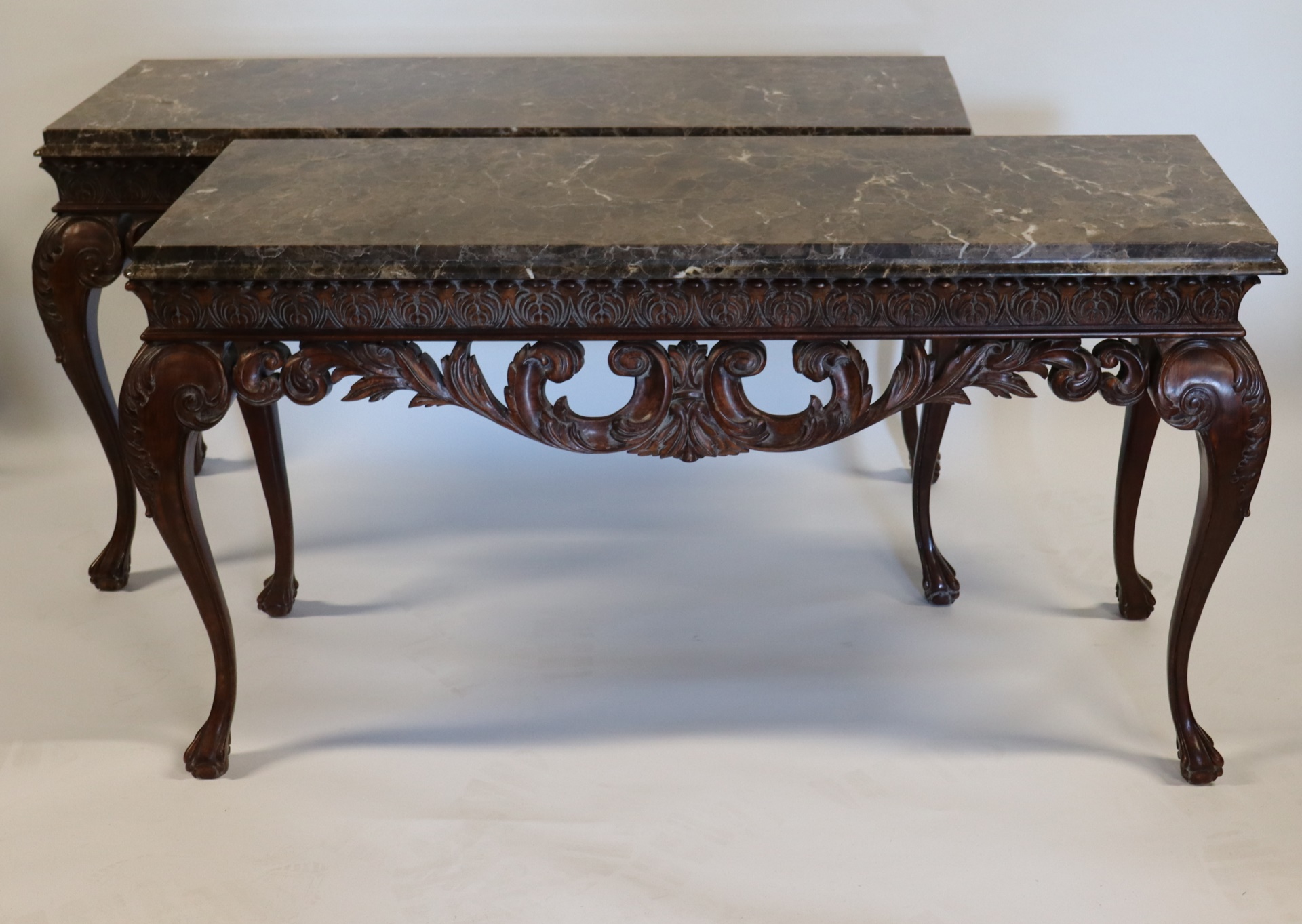 Appraisal: VINTAGE QUALITY PAIR OF IRISH STYLE CARVED Mahogany Marbletop Consoles