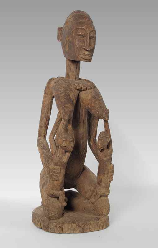 Appraisal: CARVED AFRICAN DOGON MATERNITY FIGURE '' LBS '' x ''