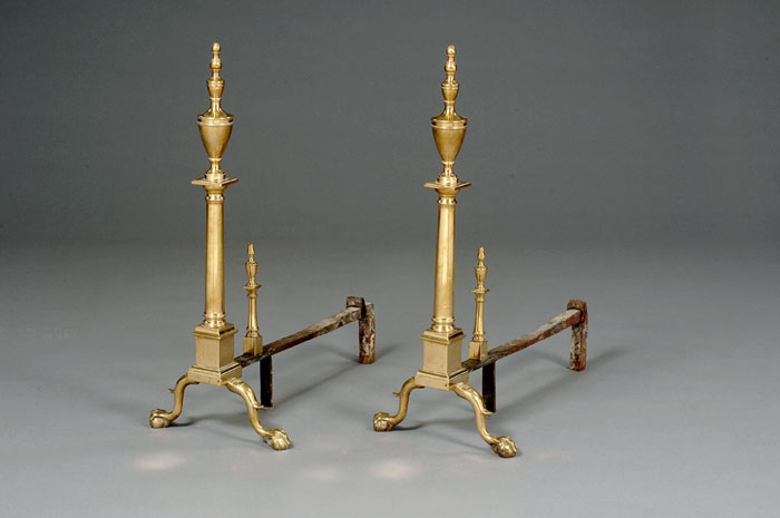 Appraisal: PAIR OF ROCOCO REVIVAL BRASS ANDIRONS The faceted spire and